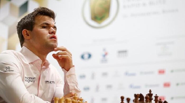 Chess legend Carlsen finishes global match against 143,000 with a tie