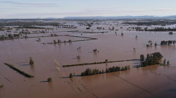 Australia begins clean-up after floods kill five, damage 10,000 properties