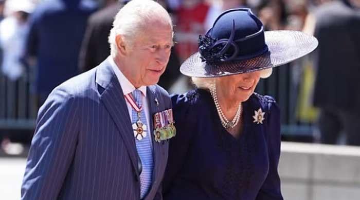 Queen Camilla drags King Charles away at airport