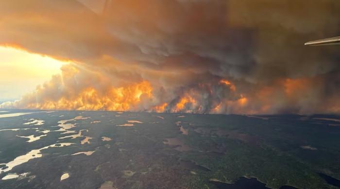 Manitoba urges thousands to evacuate as Canada wildfires spread
