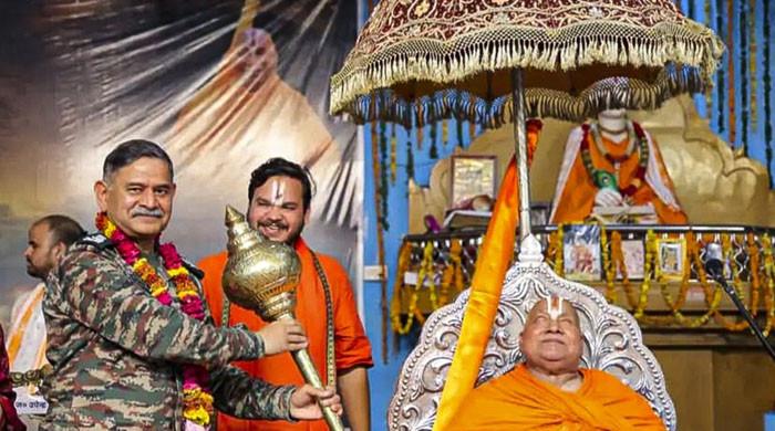 Indian army chief’s conduct questioned after visit to ashram in uniform
