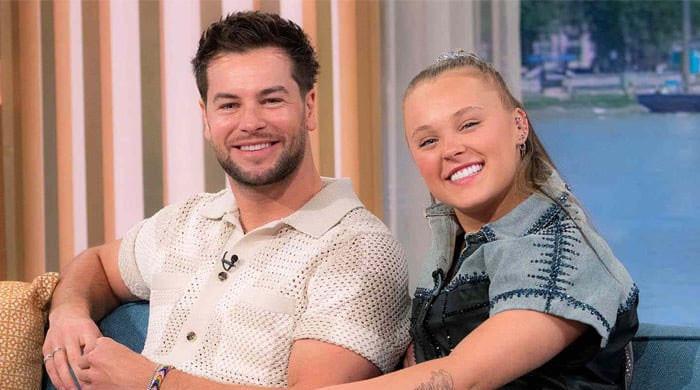 Chris Hughes deletes intimate snap with JoJo Siwa after facing heavy backlash