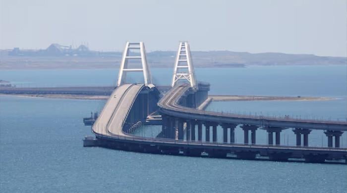 Ukraine says it hit Russia’s bridge to Crimea with underwater explosives