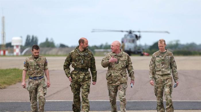 Prince William arrives in Wildcat helicopter
